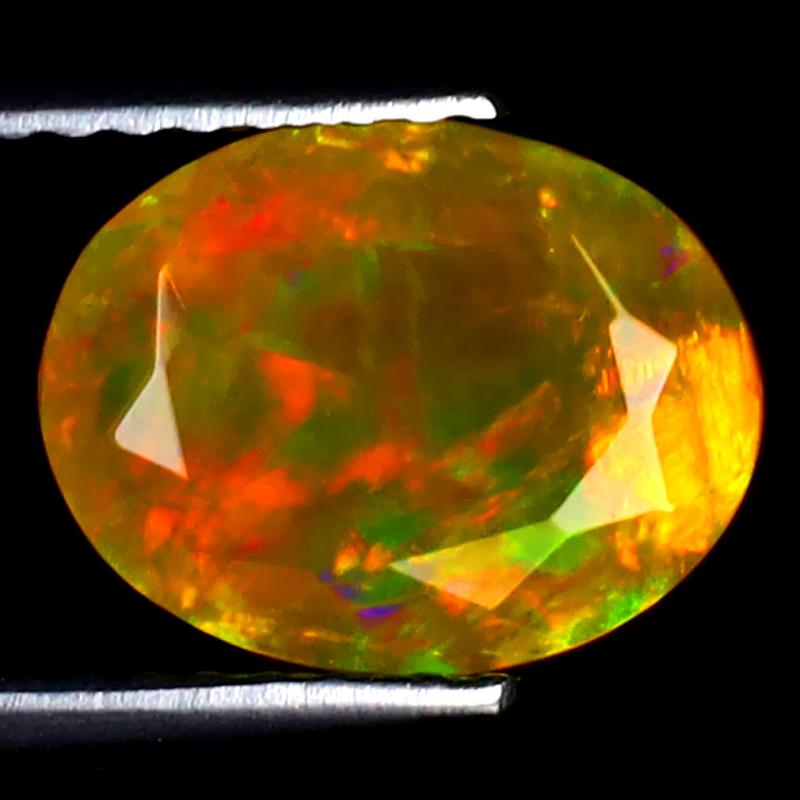 1.38 ct Extraordinary Oval (10 x 8 mm) Ethiopian 360 Degree Flashing Rainbow Opal Natural Gemstone