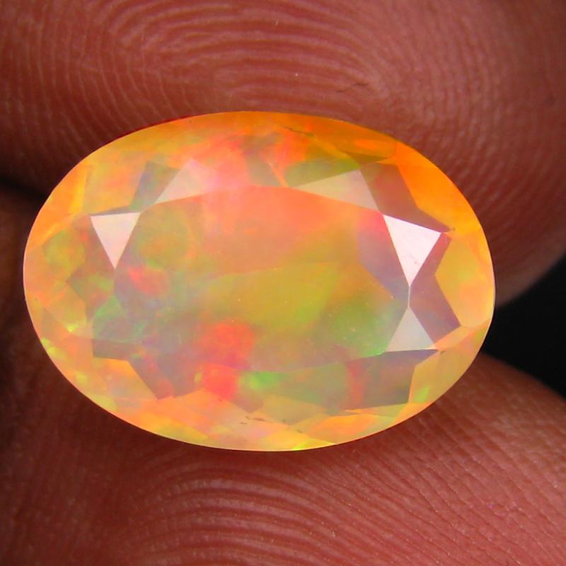 2.85 ct Flashing Oval (13 x 9 mm) Un-Heated Ethiopia Rainbow Opal Loose Gemstone