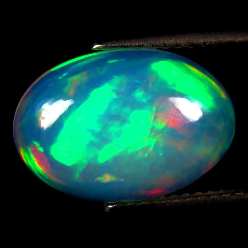 3.83 ct Terrific Oval Cabochon (15 x 10 mm) Ethiopian 360 Degree Flashing Rainbow Opal Natural Gemstone