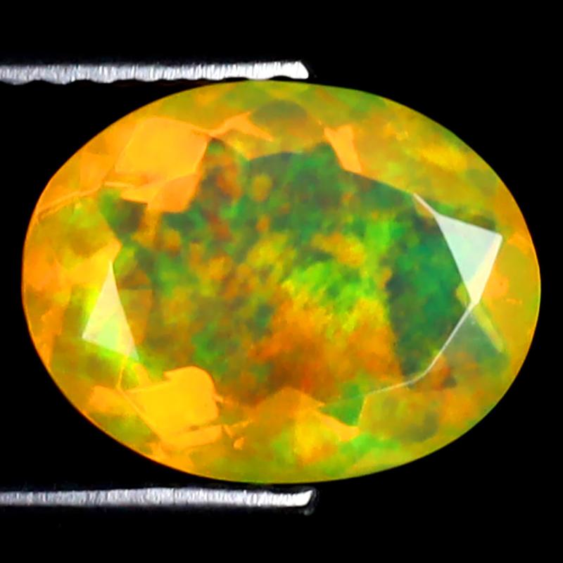 1.73 ct Sparkling Oval (10 x 8 mm) Ethiopian 360 Degree Flashing Rainbow Opal Natural Gemstone