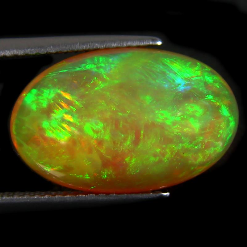 8.03 ct Pretty Oval Cabochon (19 x 12 mm) Ethiopian 360 Degree Flashing Rainbow Opal Natural Gemstone