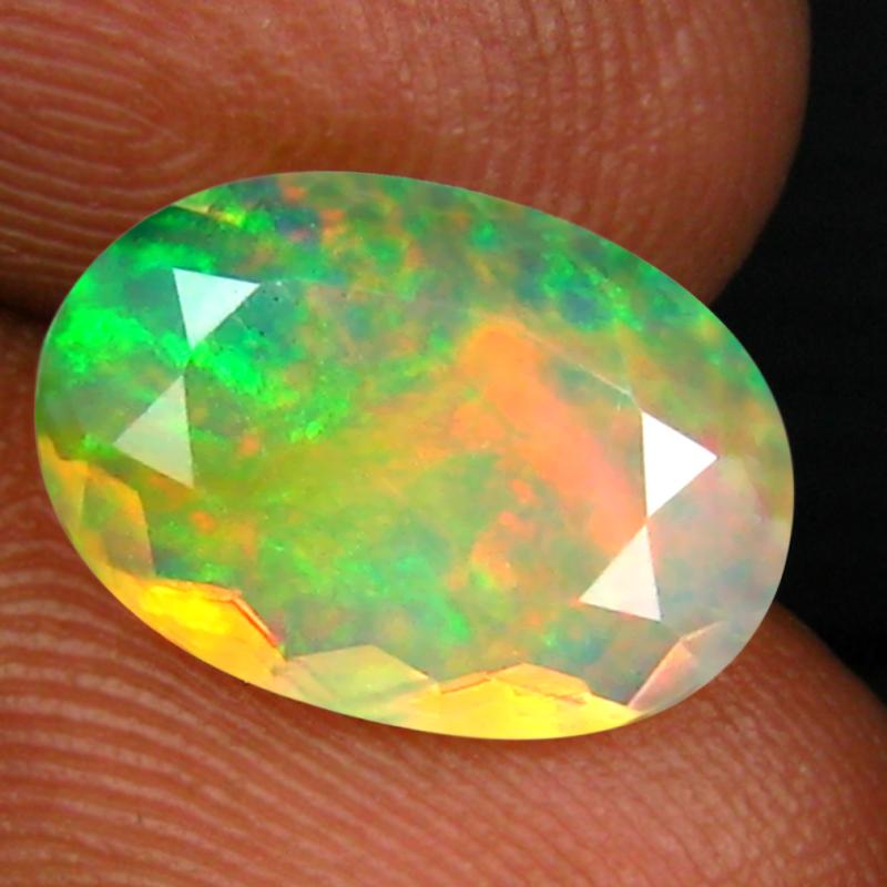 1.69 ct World class Oval (12 x 9 mm) Un-Heated Ethiopia Rainbow Opal Loose Gemstone