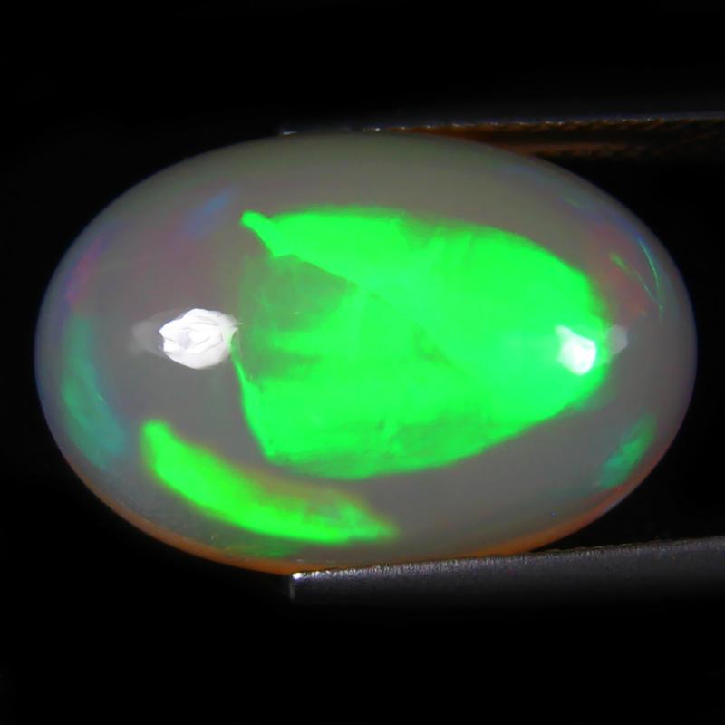 10.52 ct Unbelievable Oval Cabochon (21 x 14 mm) Flashing 360 Degree Multicolor Rainbow Opal Gemstone