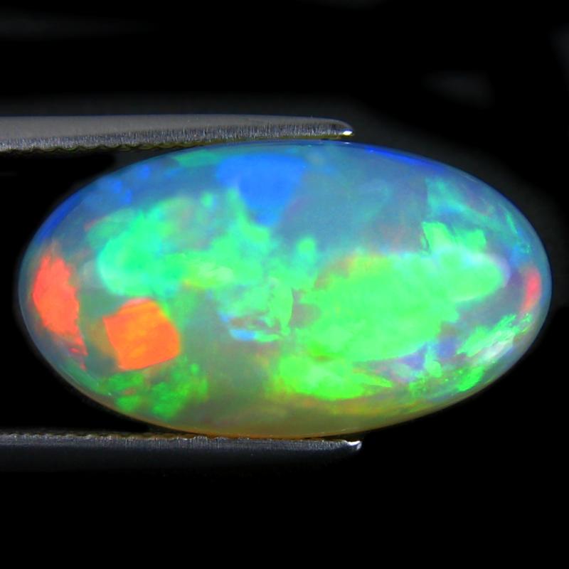 10.22 ct World class Oval Cabochon (21 x 12 mm) Ethiopian 360 Degree Flashing Rainbow Opal Natural Gemstone