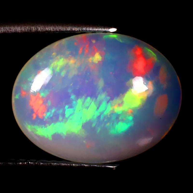 3.09 ct Tremendous Oval Cabochon (14 x 11 mm) Ethiopian 360 Degree Flashing Rainbow Opal Natural Gemstone