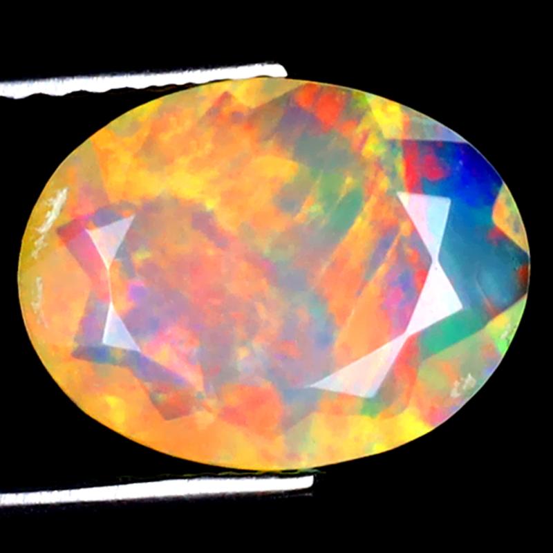 1.41 ct Sparkling Oval (11 x 8 mm) Ethiopian 360 Degree Flashing Rainbow Opal Natural Gemstone