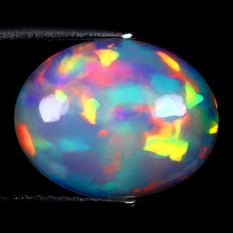 2.72 ct Terrific Oval Cabochon (14 x 11 mm) Ethiopian 360 Degree Flashing Rainbow Opal Natural Gemstone
