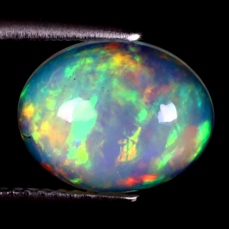 2.78 ct Exquisite Oval Cabochon (11 x 9 mm) Ethiopian 360 Degree Flashing Rainbow Opal Natural Gemstone