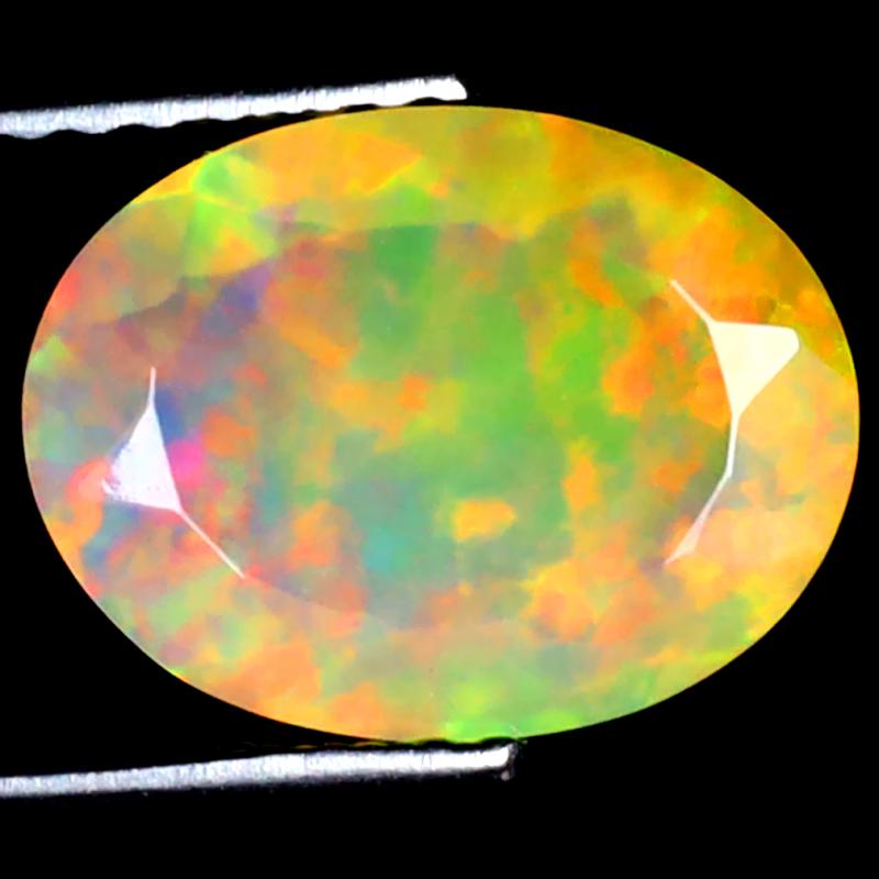 1.68 ct Awe-inspiring Oval (11 x 8 mm) Ethiopian 360 Degree Flashing Rainbow Opal Natural Gemstone