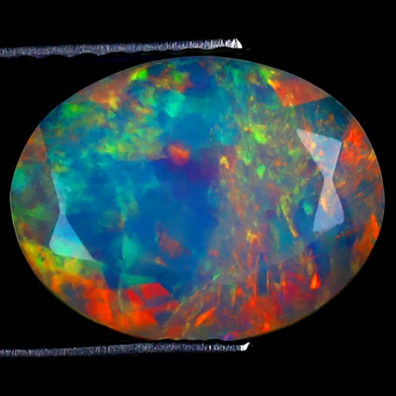1.37 ct Exquisite Oval (11 x 8 mm) Ethiopian 360 Degree Flashing Rainbow Opal Natural Gemstone