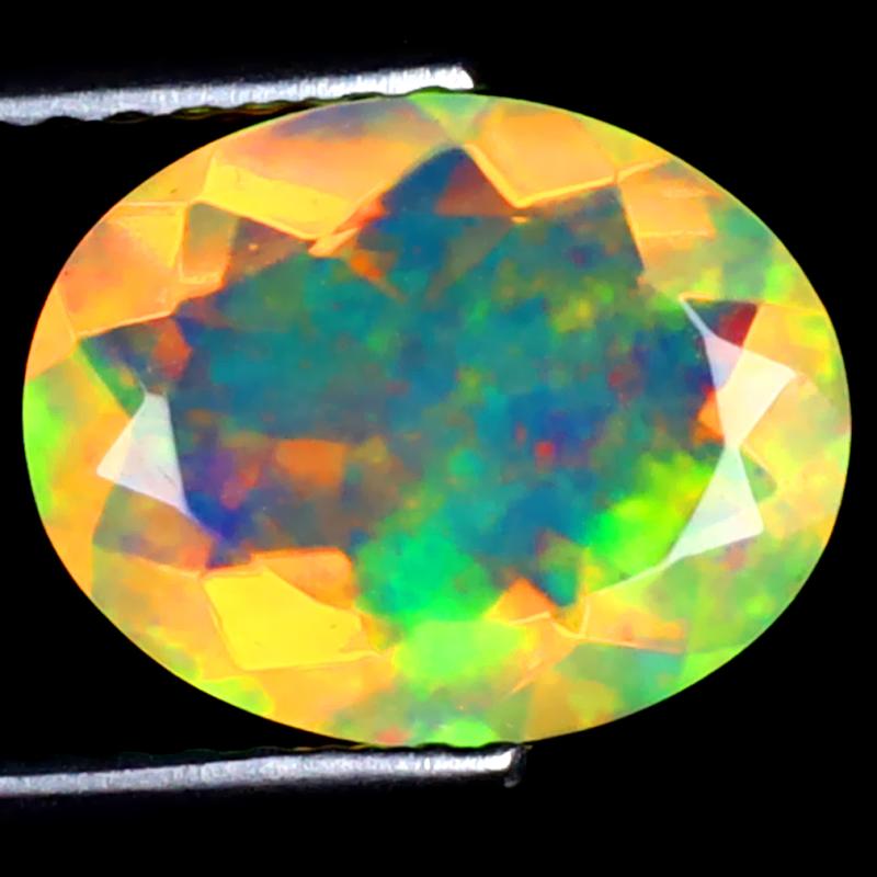 1.54 ct Excellent Oval (11 x 8 mm) Ethiopian 360 Degree Flashing Rainbow Opal Natural Gemstone