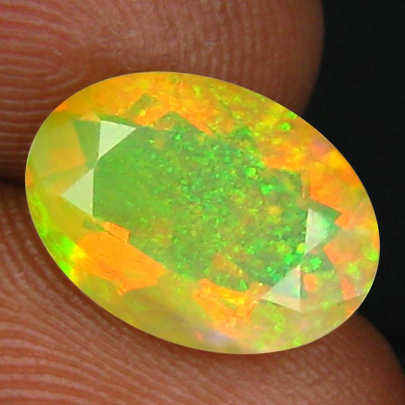 2.31 ct Eye-catching Oval (12 x 8 mm) Un-Heated Ethiopia Rainbow Opal Loose Gemstone