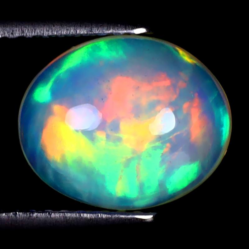 2.73 ct Great looking Oval Cabochon (11 x 9 mm) Ethiopian 360 Degree Flashing Rainbow Opal Natural Gemstone