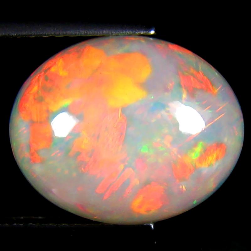6.47 ct Terrific Oval Cabochon (15 x 12 mm) Flashing 360 Degree Multicolor Rainbow Opal Gemstone