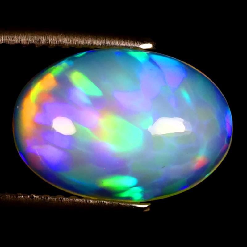 3.75 ct Excellent Oval Cabochon (14 x 10 mm) Ethiopian 360 Degree Flashing Rainbow Opal Natural Gemstone