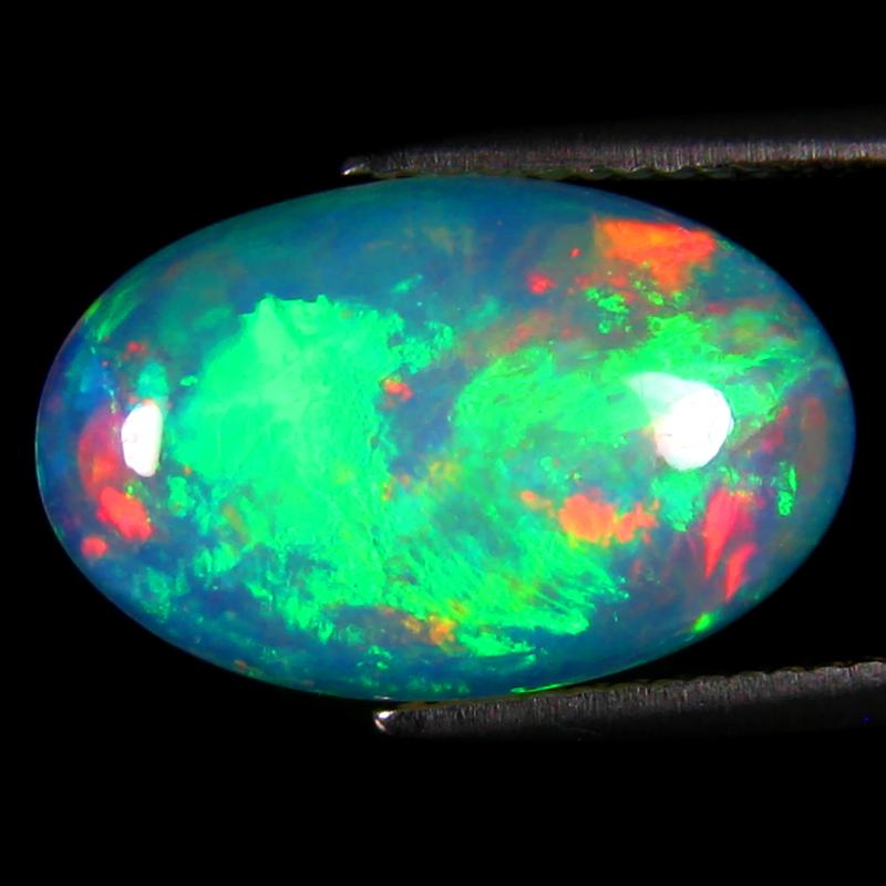 4.69 ct Resplendent Oval Cabochon (16 x 10 mm) Ethiopian 360 Degree Flashing Rainbow Opal Natural Gemstone