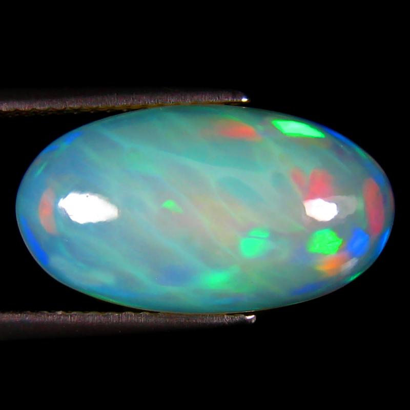 6.50 ct Shimmering Oval Cabochon (19 x 11 mm) Ethiopian 360 Degree Flashing Rainbow Opal Natural Gemstone