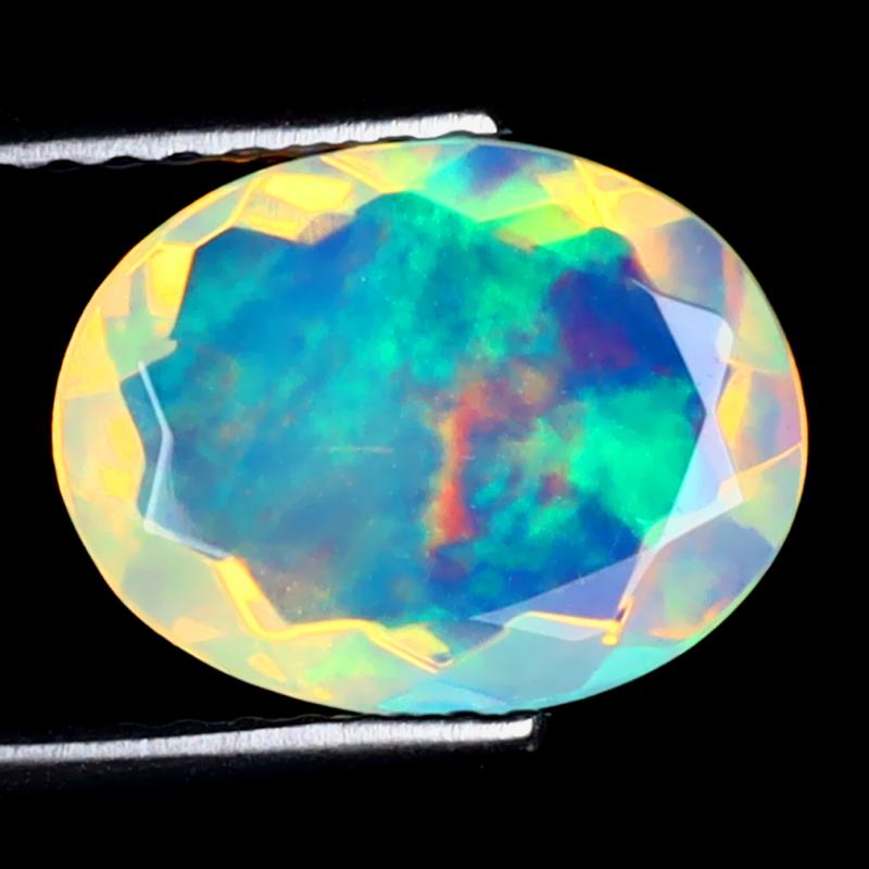 1.58 ct Great looking Oval (11 x 8 mm) Ethiopian 360 Degree Flashing Rainbow Opal Natural Gemstone