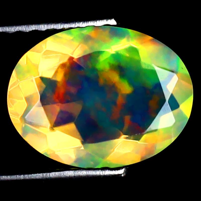 1.37 ct Very good Oval (10 x 8 mm) Ethiopian 360 Degree Flashing Rainbow Opal Natural Gemstone
