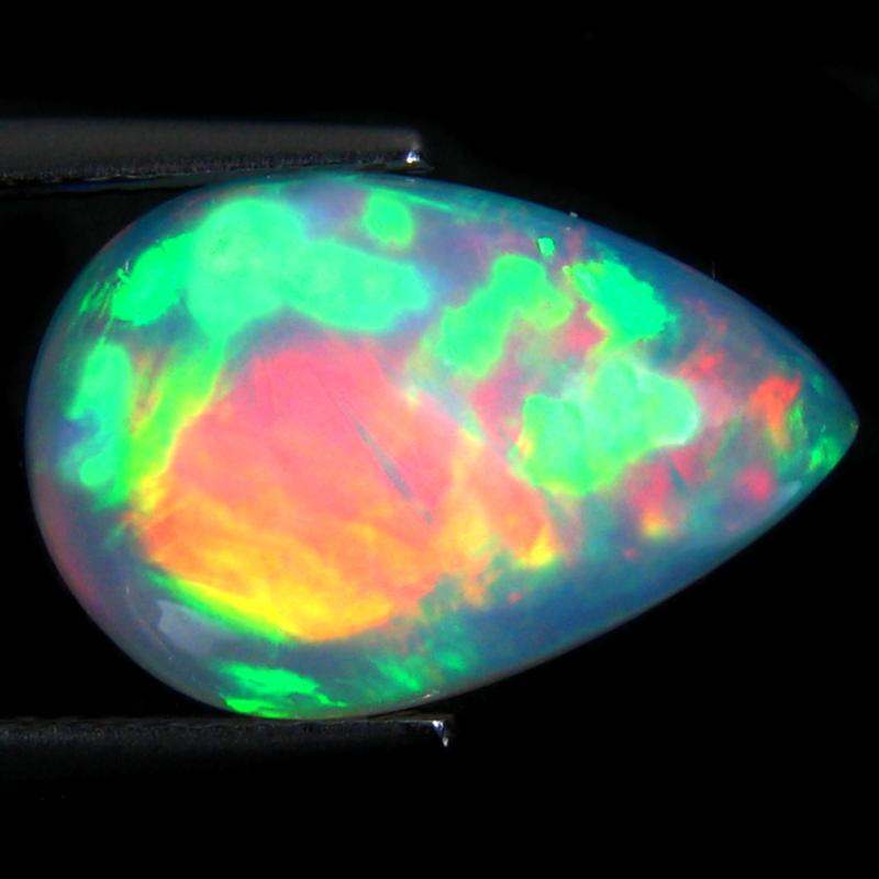 5.87 ct Great looking Pear Cabochon (16 x 10 mm) Ethiopian 360 Degree Flashing Rainbow Opal Natural Gemstone