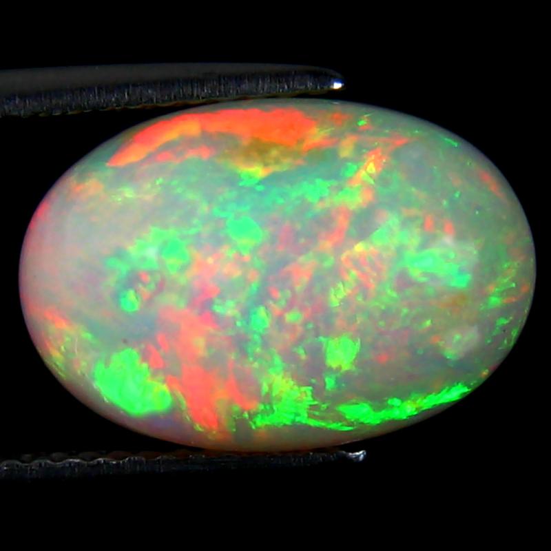 5.29 ct Gorgeous Oval Cabochon (14 x 10 mm) Ethiopian 360 Degree Flashing Rainbow Opal Natural Gemstone