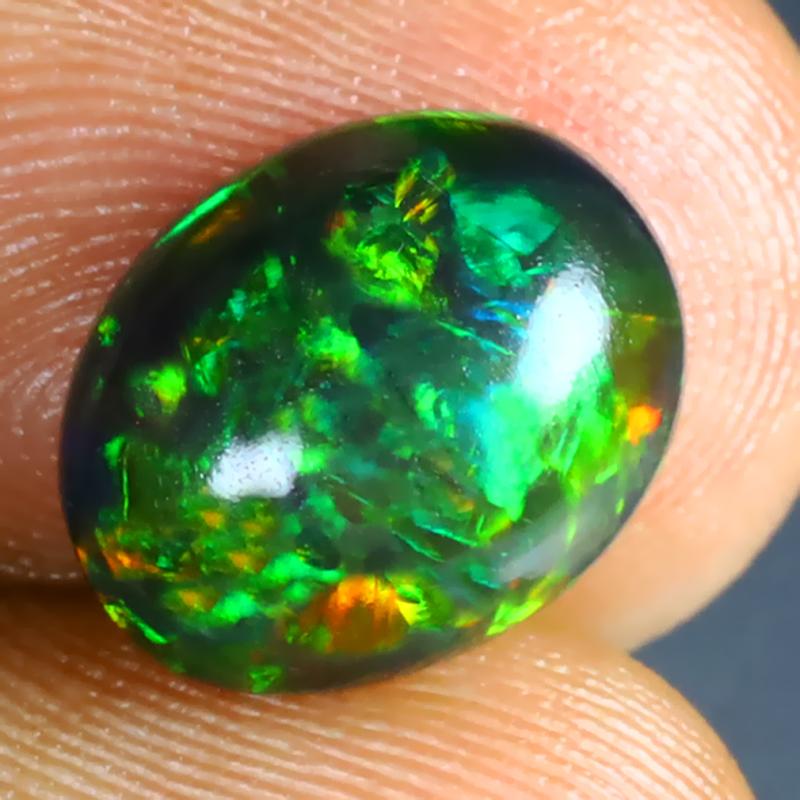 2.67 ct Flashing Oval Cabochon (12 x 9 mm) Ethiopian 360 Degree Flashing Black Opal Natural Gemstone