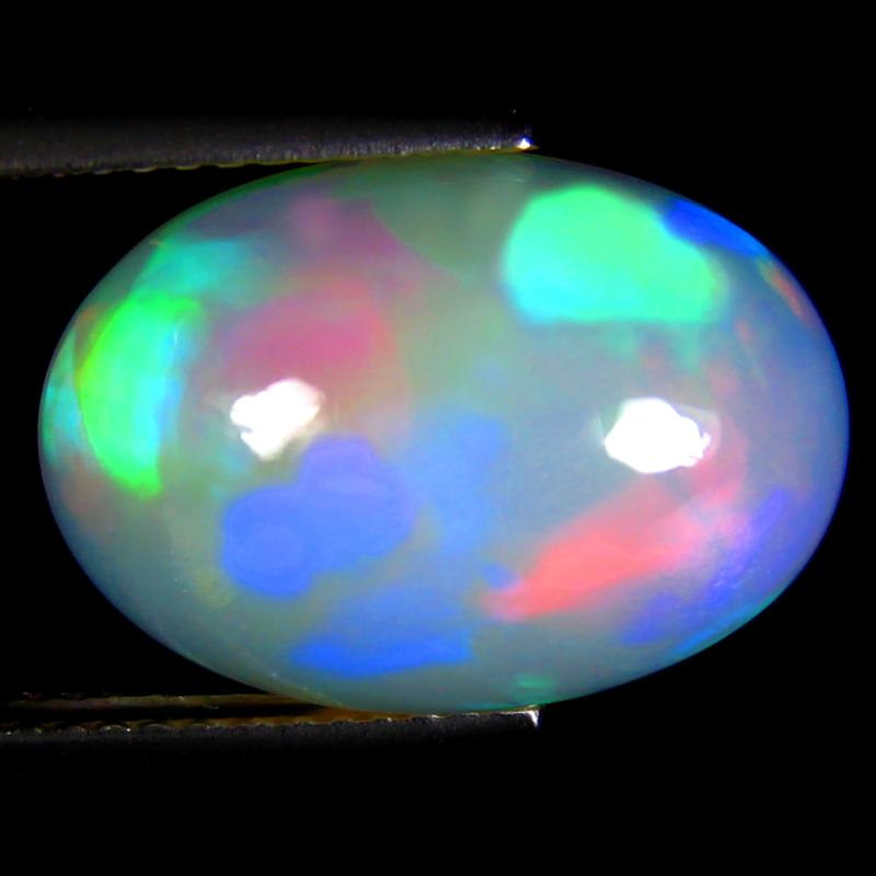 7.54 ct Wonderful Oval Cabochon (17 x 12 mm) Flashing 360 Degree Multicolor Rainbow Opal Gemstone