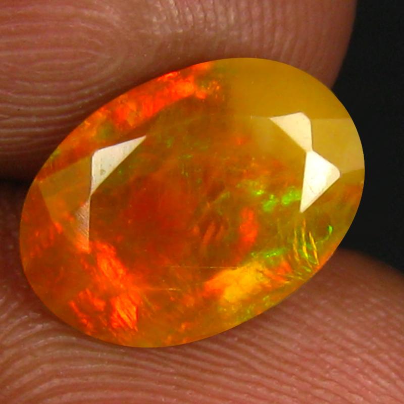 1.58 ct Pretty Oval (12 x 8 mm) Un-Heated Ethiopia Rainbow Opal Loose Gemstone