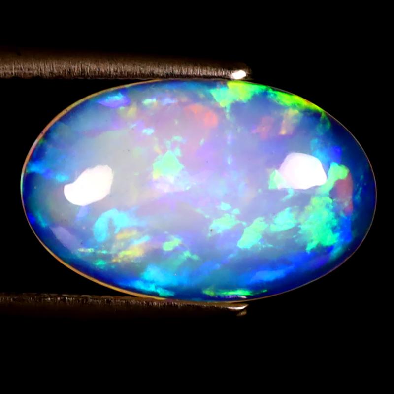 2.67 ct Outstanding Oval Cabochon (14 x 9 mm) Ethiopian 360 Degree Flashing Rainbow Opal Natural Gemstone