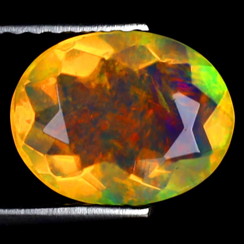 1.39 ct First-class Oval (10 x 8 mm) Ethiopian 360 Degree Flashing Rainbow Opal Natural Gemstone