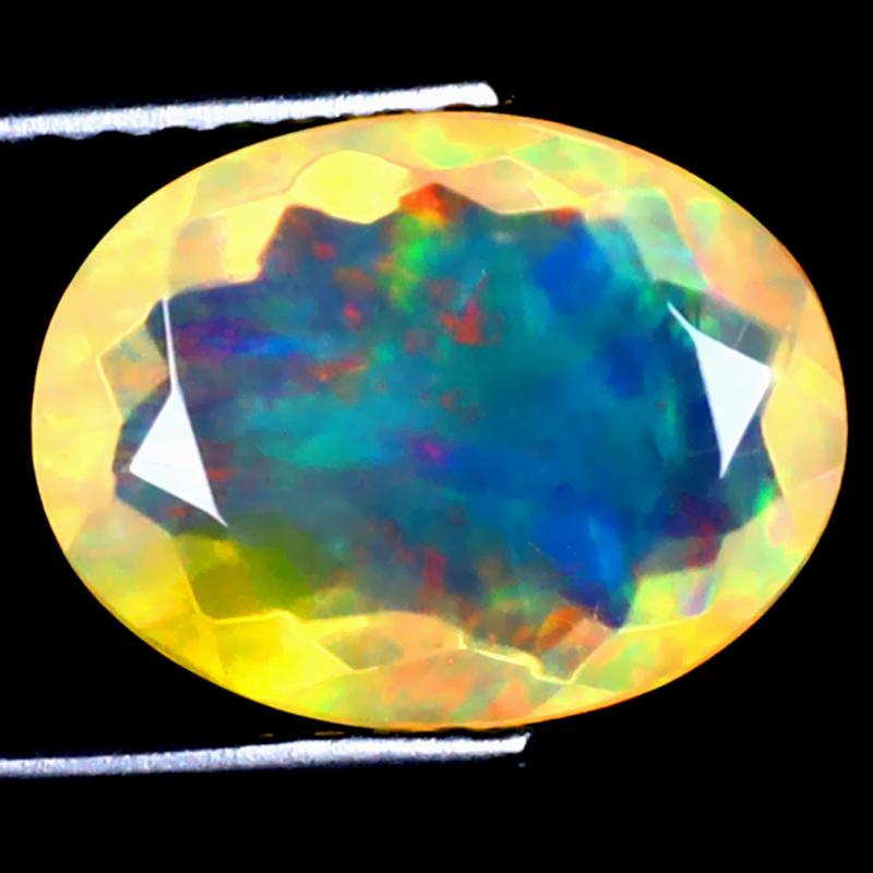 2.13 ct Flashing Oval (11 x 8 mm) Ethiopian 360 Degree Flashing Rainbow Opal Natural Gemstone
