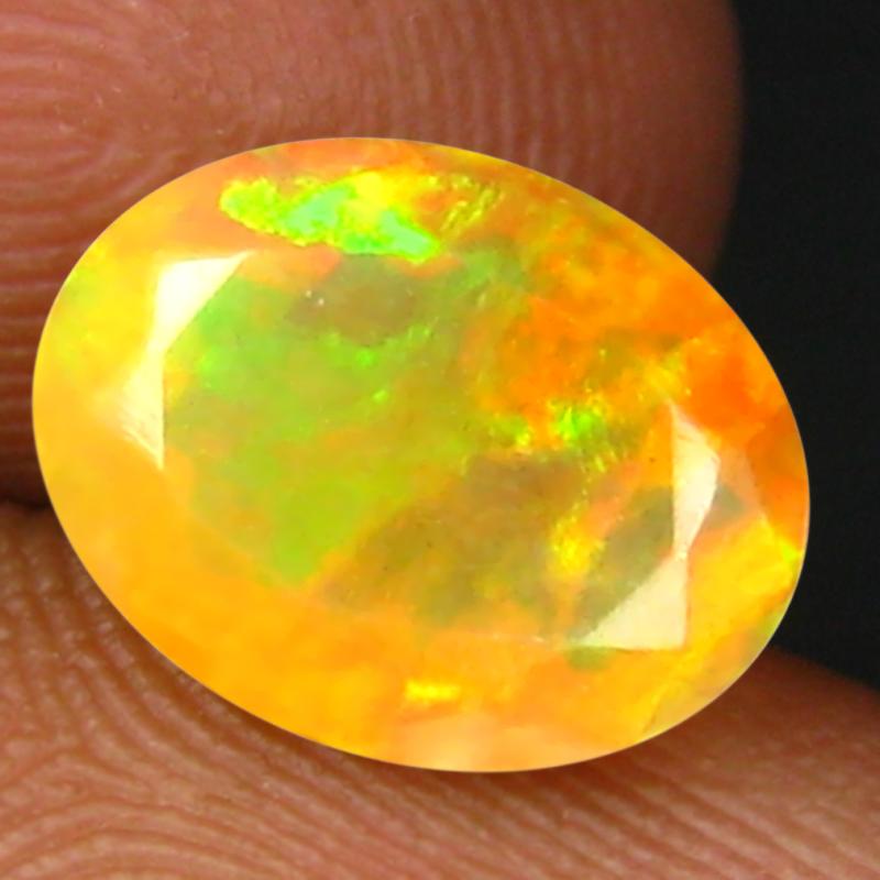 1.35 ct Excellent Oval (10 x 7 mm) Un-Heated Ethiopia Rainbow Opal Loose Gemstone