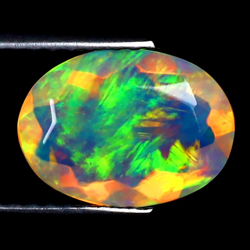 1.35 ct Significant Oval (10 x 8 mm) Ethiopian 360 Degree Flashing Rainbow Opal Natural Gemstone