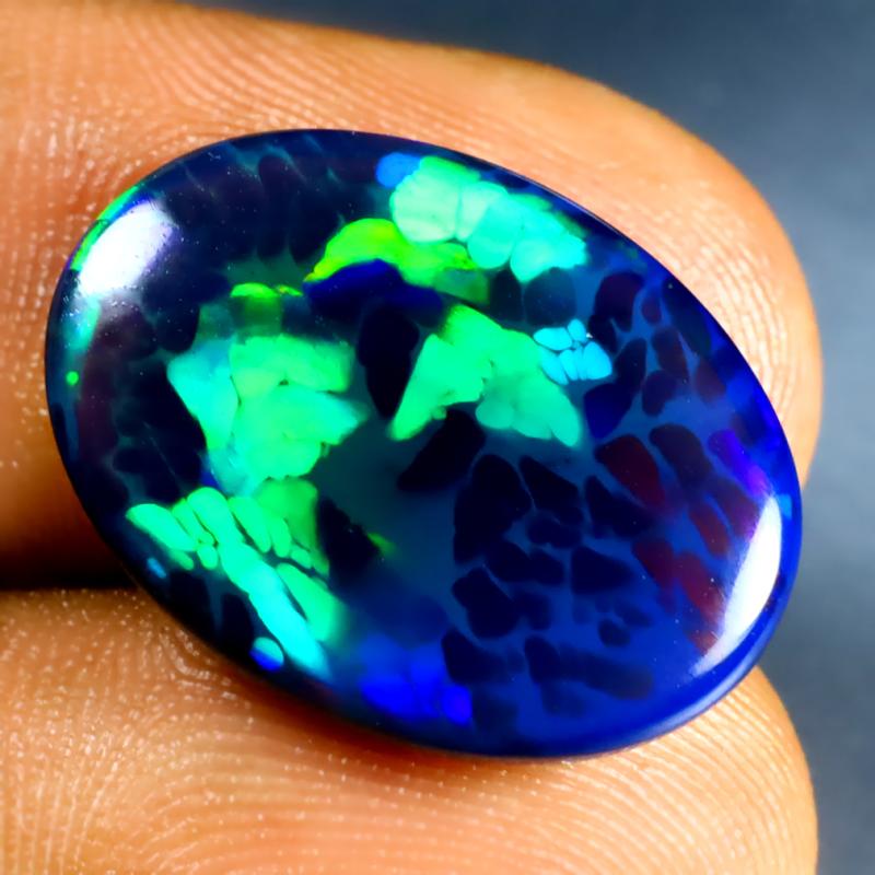 8.41 ct Incomparable Oval Cabochon (20 x 14 mm) Ethiopian 360 Degree Flashing Black Opal Natural Gemstone