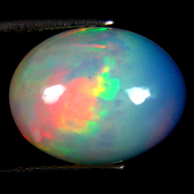 4.47 ct Romantic Oval Cabochon (13 x 10 mm) Ethiopian 360 Degree Flashing Rainbow Opal Natural Gemstone
