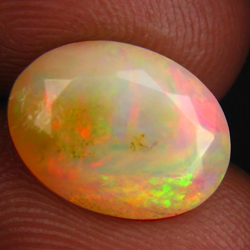 2.48 ct Very good Oval (12 x 9 mm) Un-Heated Ethiopia Rainbow Opal Loose Gemstone