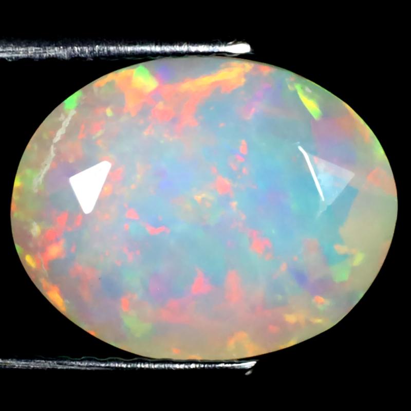 3.38 ct Sparkling Oval (13 x 10 mm) Un-Heated Ethiopia Rainbow Opal Loose Gemstone
