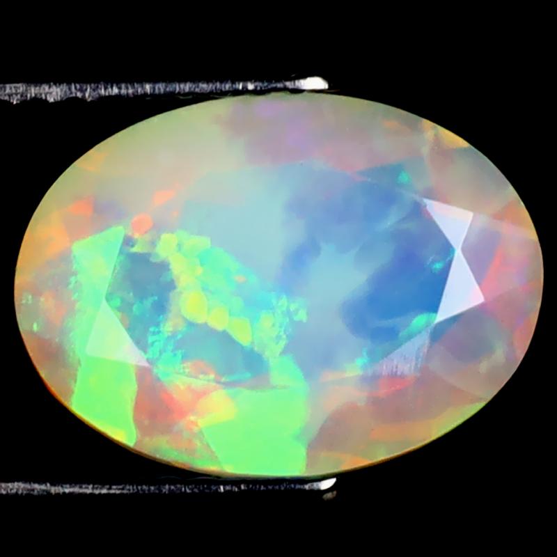 2.84 ct Mesmerizing Oval (12 x 9 mm) Flashing 360 Degree Multicolor Rainbow Opal Gemstone