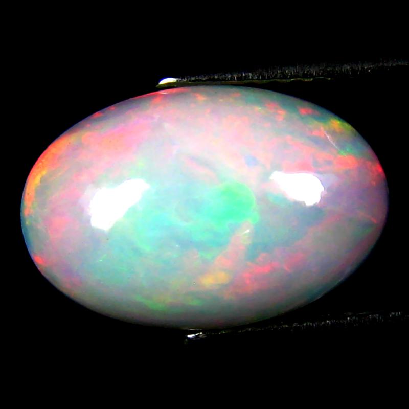 3.35 ct Eye-opening Oval Cabochon (14 x 9 mm) Ethiopian 360 Degree Flashing Rainbow Opal Natural Gemstone