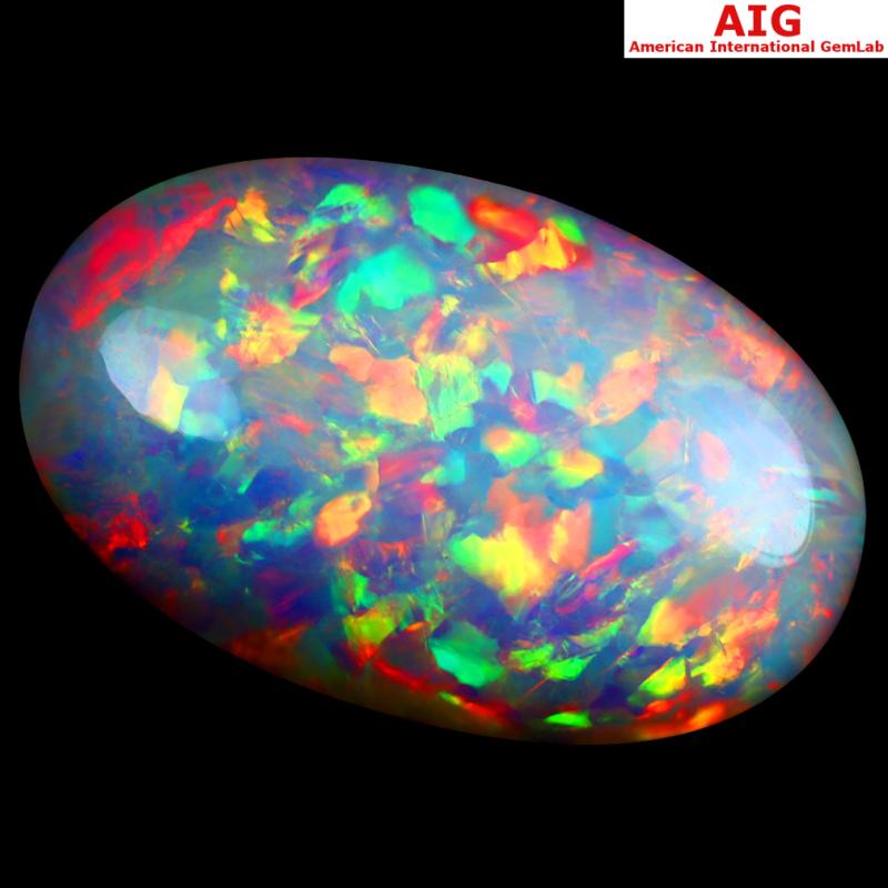 19.81 ct AIG CERTIFIED ELEGANT OVAL CABOCHON CUT (27 X 17 MM) FLASHING 360 DEGREE MULTICOLOR RAINBOW OPAL