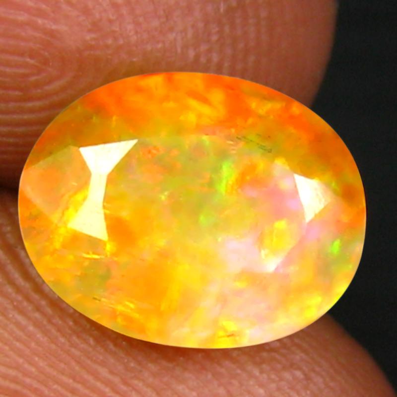 1.86 ct Astonishing Oval (10 x 8 mm) Un-Heated Ethiopia Rainbow Opal Loose Gemstone