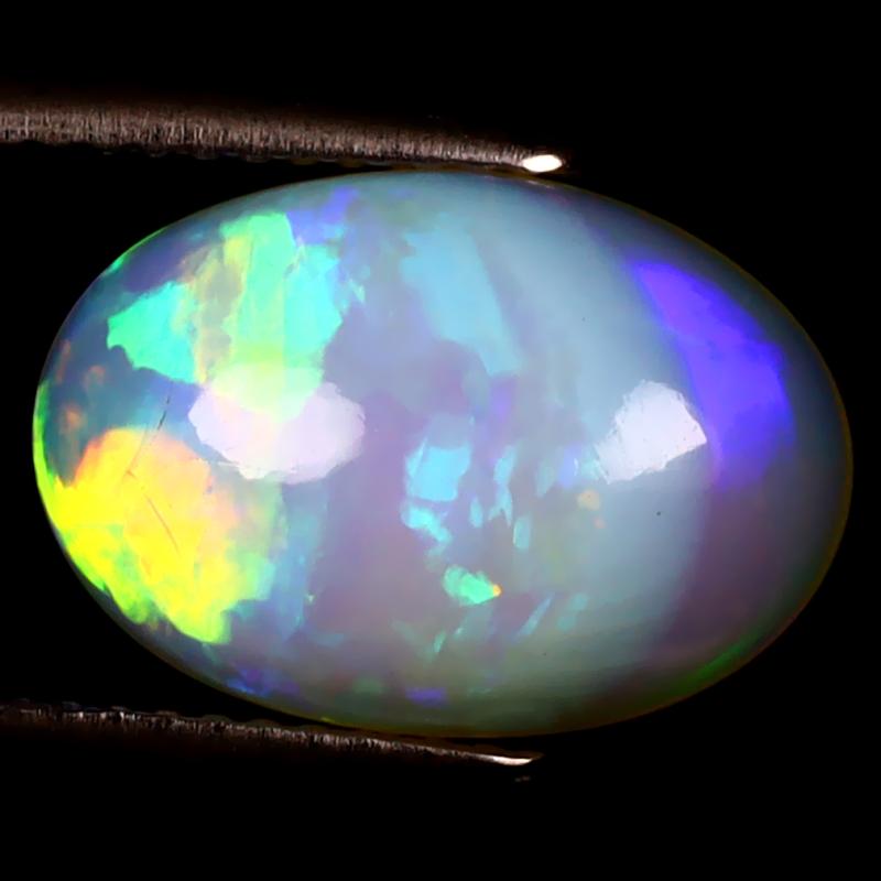 3.50 ct Sparkling Oval Cabochon (14 x 10 mm) Ethiopian 360 Degree Flashing Rainbow Opal Natural Gemstone