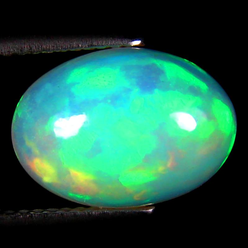 3.76 ct Stunning Oval Cabochon (13 x 10 mm) Ethiopian 360 Degree Flashing Rainbow Opal Natural Gemstone