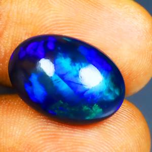 7.52 ct Great looking Oval Cabochon (17 x 12 mm) Ethiopian 360 Degree Flashing Black Opal Natural Gemstone